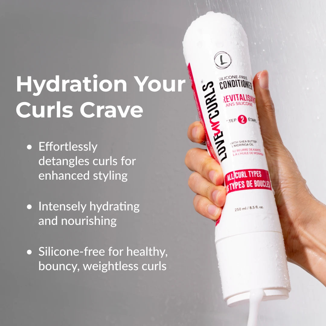 Hand holding a bottle of 'Layn's' hair product with text about hydration and styling benefits on a gray background.