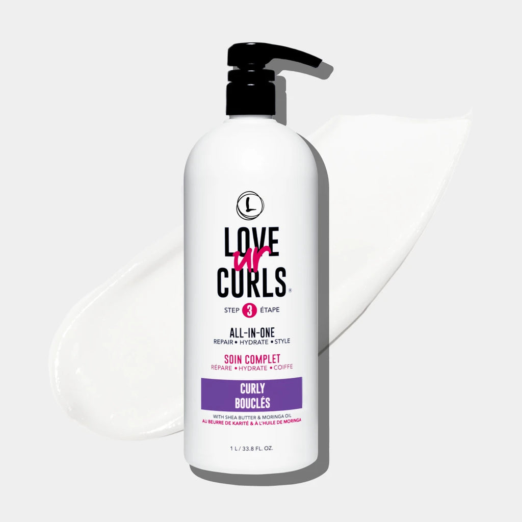 Bottle of Love ur Curls hair care product on a white background